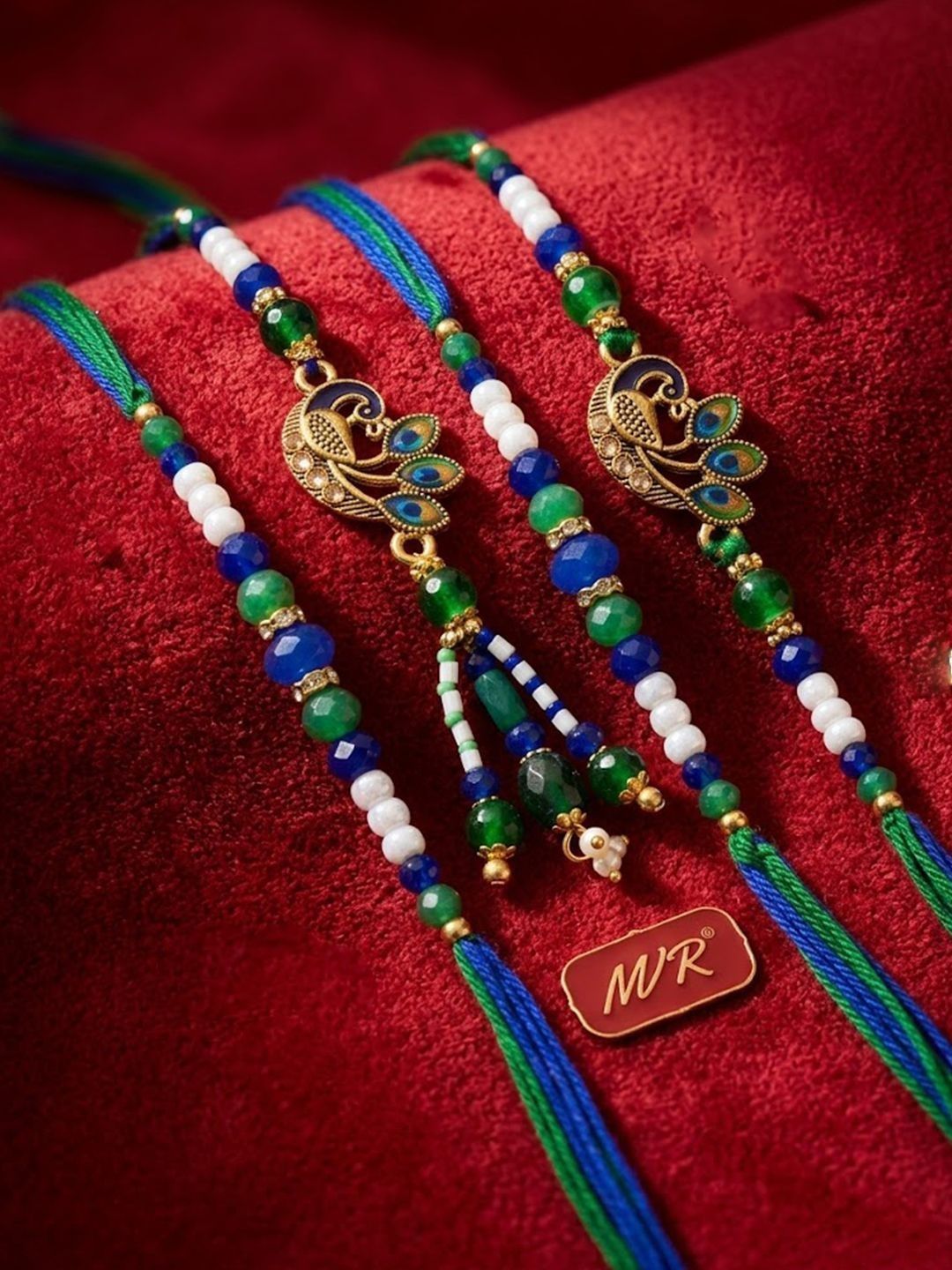 Dhiyona Set Of 4 Green Peacock Design Artificial Beads Thread Rakhi With Roli Chawal