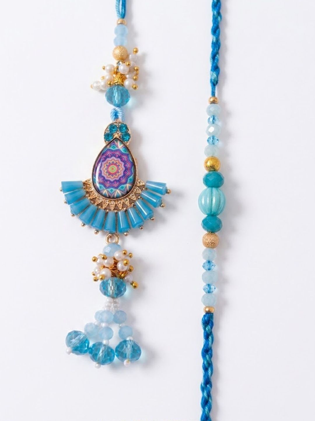 Dhiyona Set Of 2 Transparent Beads Pear Shape Bhaiya Bhabhi Rakhi With Roli Chawal Chandan