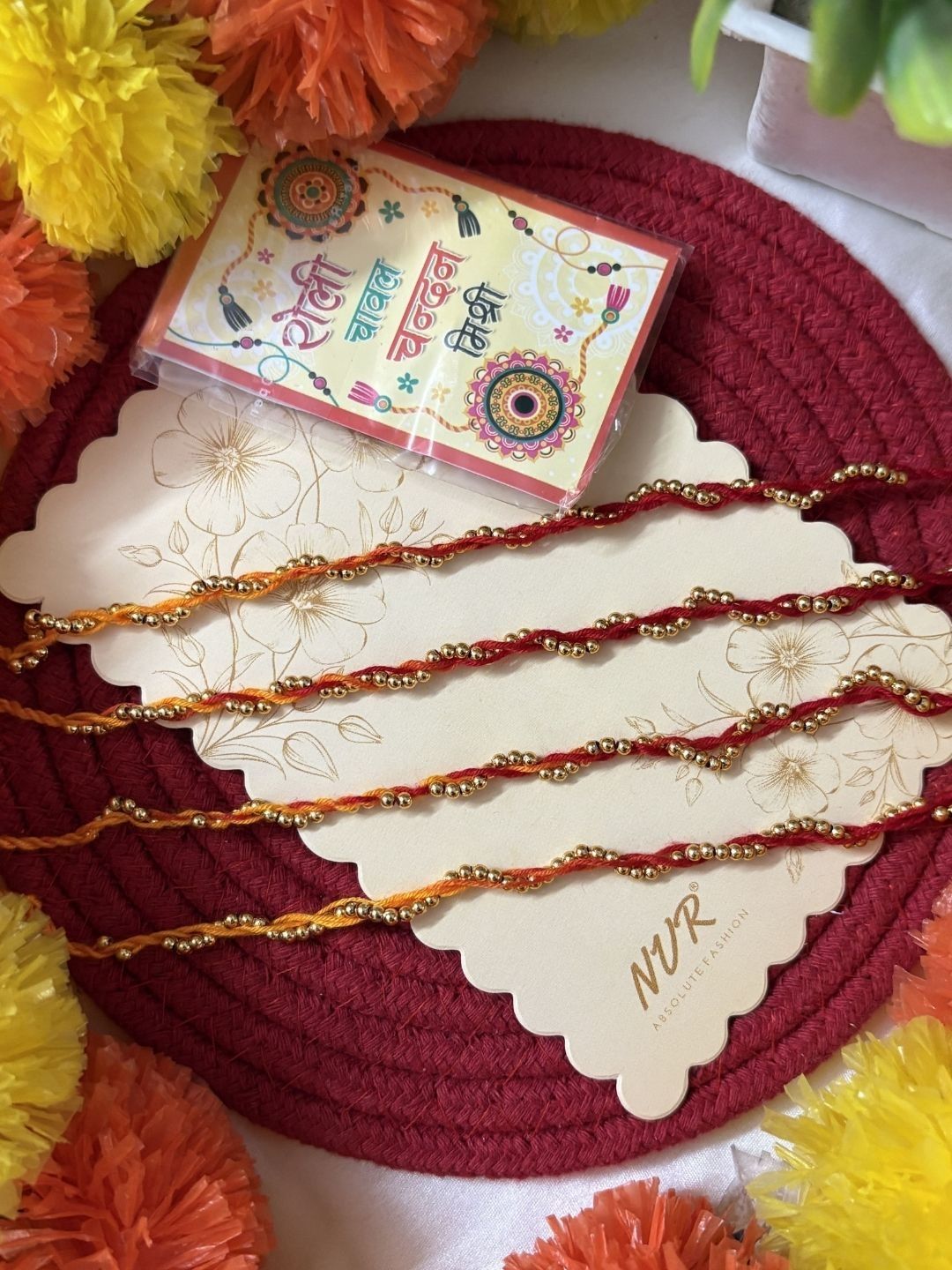 Dhiyona Set Of 4 Yellow & Red Thread Rakhi With Roli Chawal Chandan Mishri