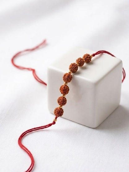 Dhiyona Religious Rudraksh Thread Rakhi With Roli Chawal Chandan Mishri
