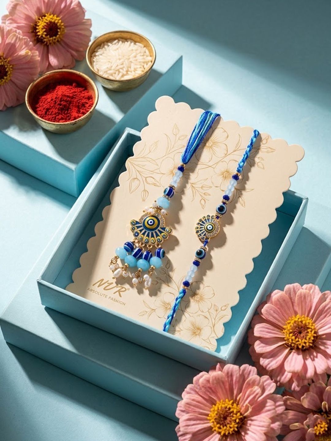 Dhiyona Set Of 2 Blue Evil Eye Artificial Beads Bhaiya Bhabhi Rakhi With Roli Chawal