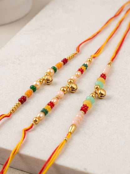 Dhiyona Set Of 3 Artificial Beads Orange Thread Rakhi With Roli Chawal Chandan Mishri