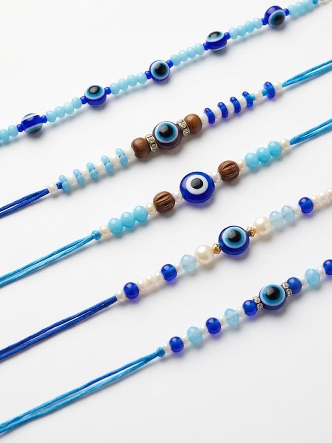 Dhiyona Set Of 5 Blue Evil Eye Thread Rakhi With Roli Chawal Chandan Mishri
