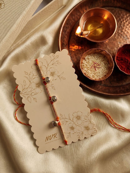 Dhiyona Golden Ghungroo Thread Rakhi With Roli Chawal Chandan Mishri