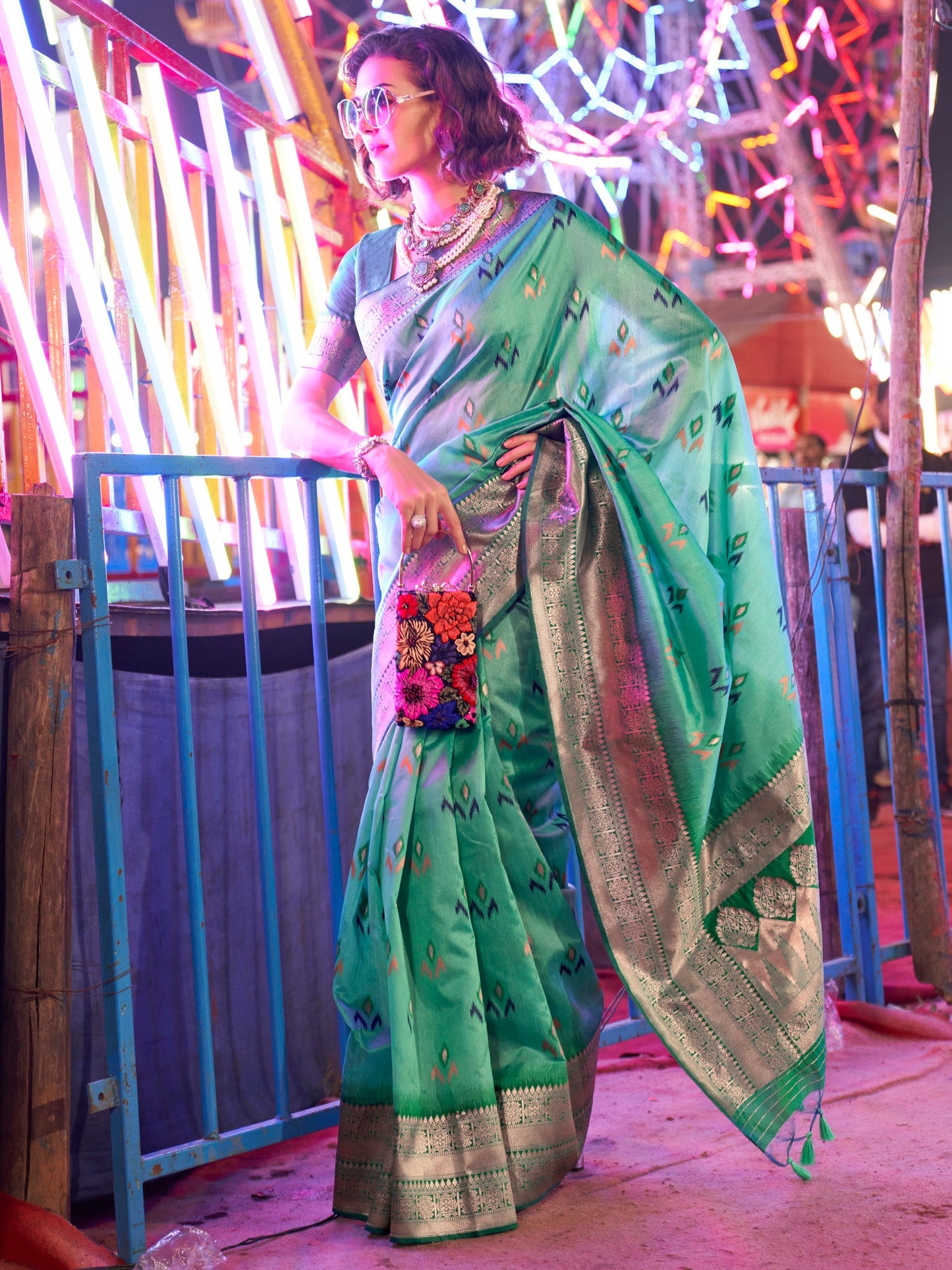 Women's Silk Blend Sea Green Woven Design Designer Saree With Blouse Piece