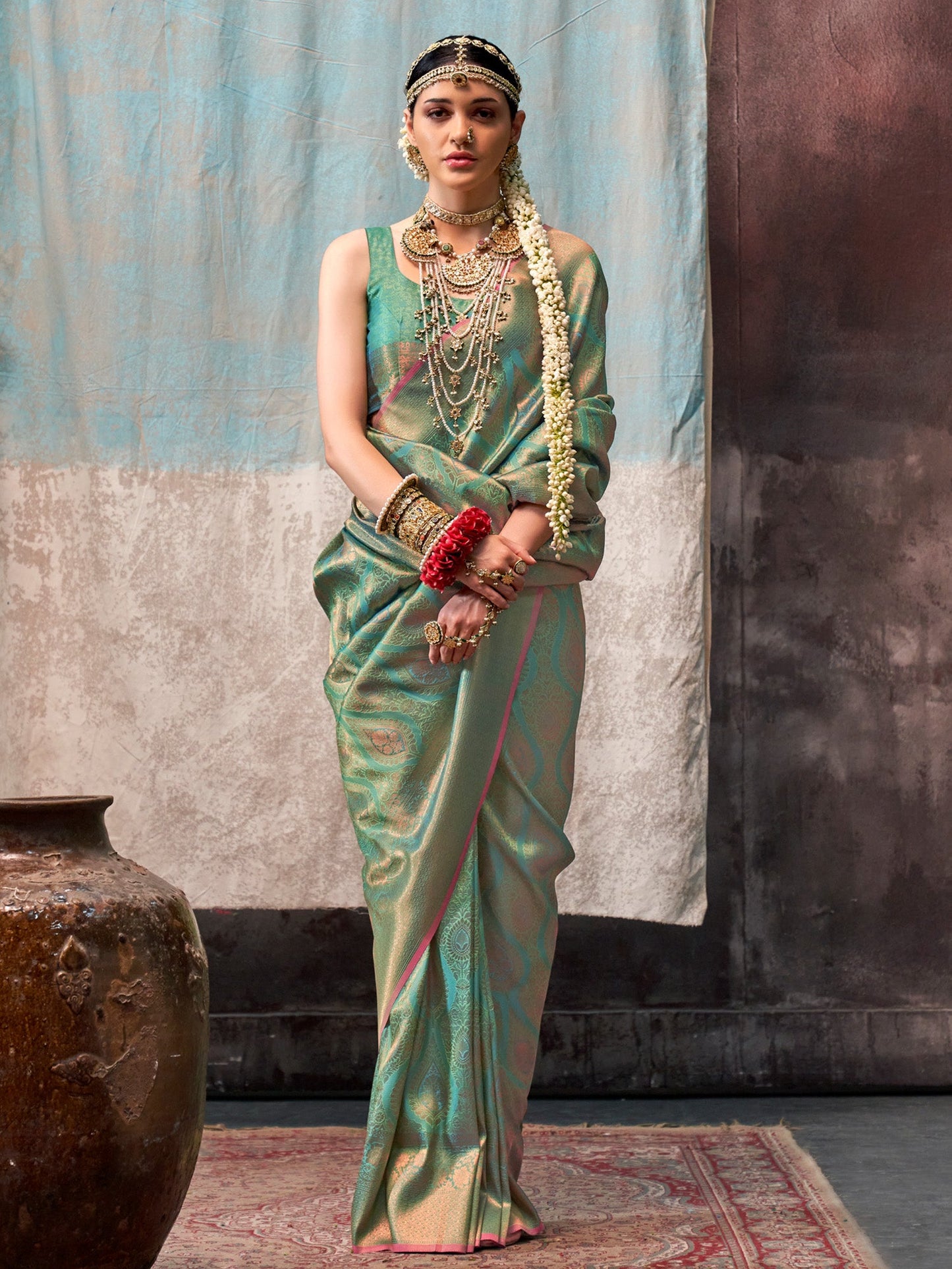 Women's Silk Blend Sea Green Woven Design Designer Saree With Blouse Piece