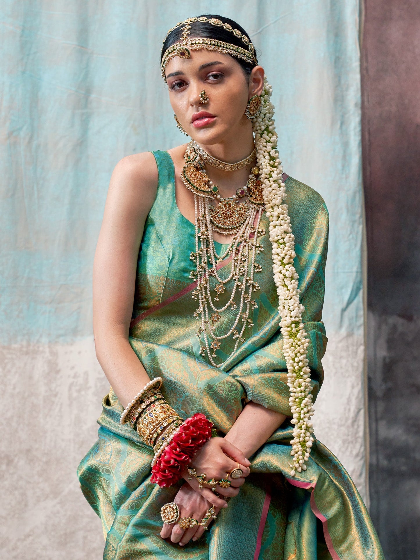 Women's Silk Blend Sea Green Woven Design Designer Saree With Blouse Piece
