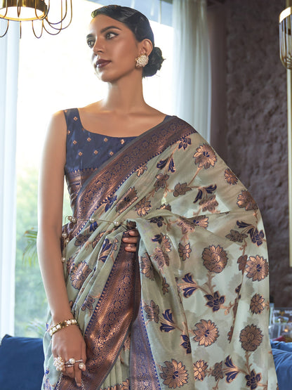 Women's Organza Turquoise Woven Design Designer Saree With Blouse Piece