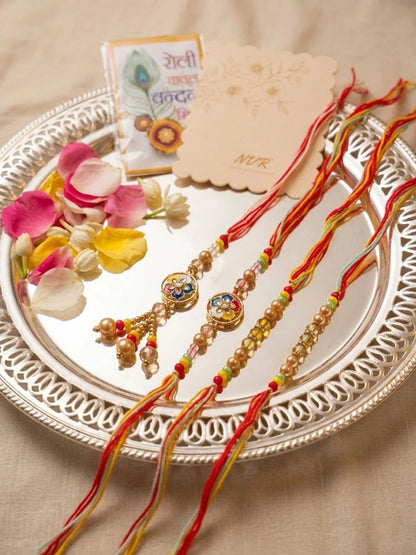 Dhiyona Set Of 4 Artificial Beads Family Pack Thread Rakhi With Roli Chawal Chandan Mishri