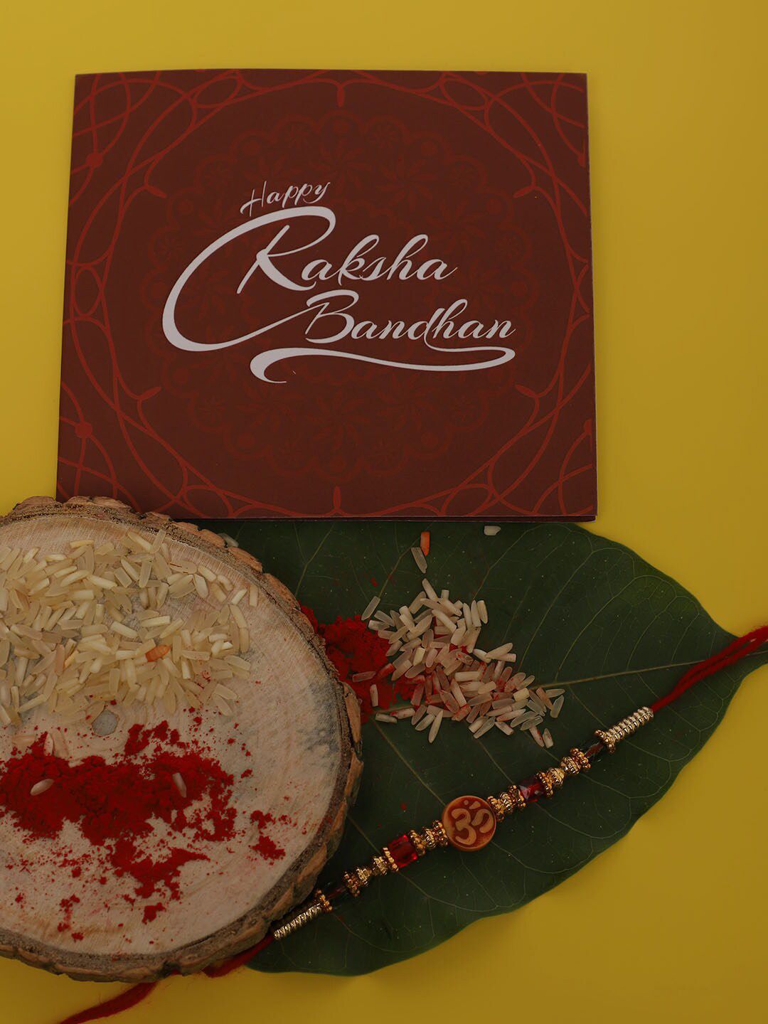 Dhiyona Unisex Set Of 2 Beaded Thread Rakhi With Greeting Card