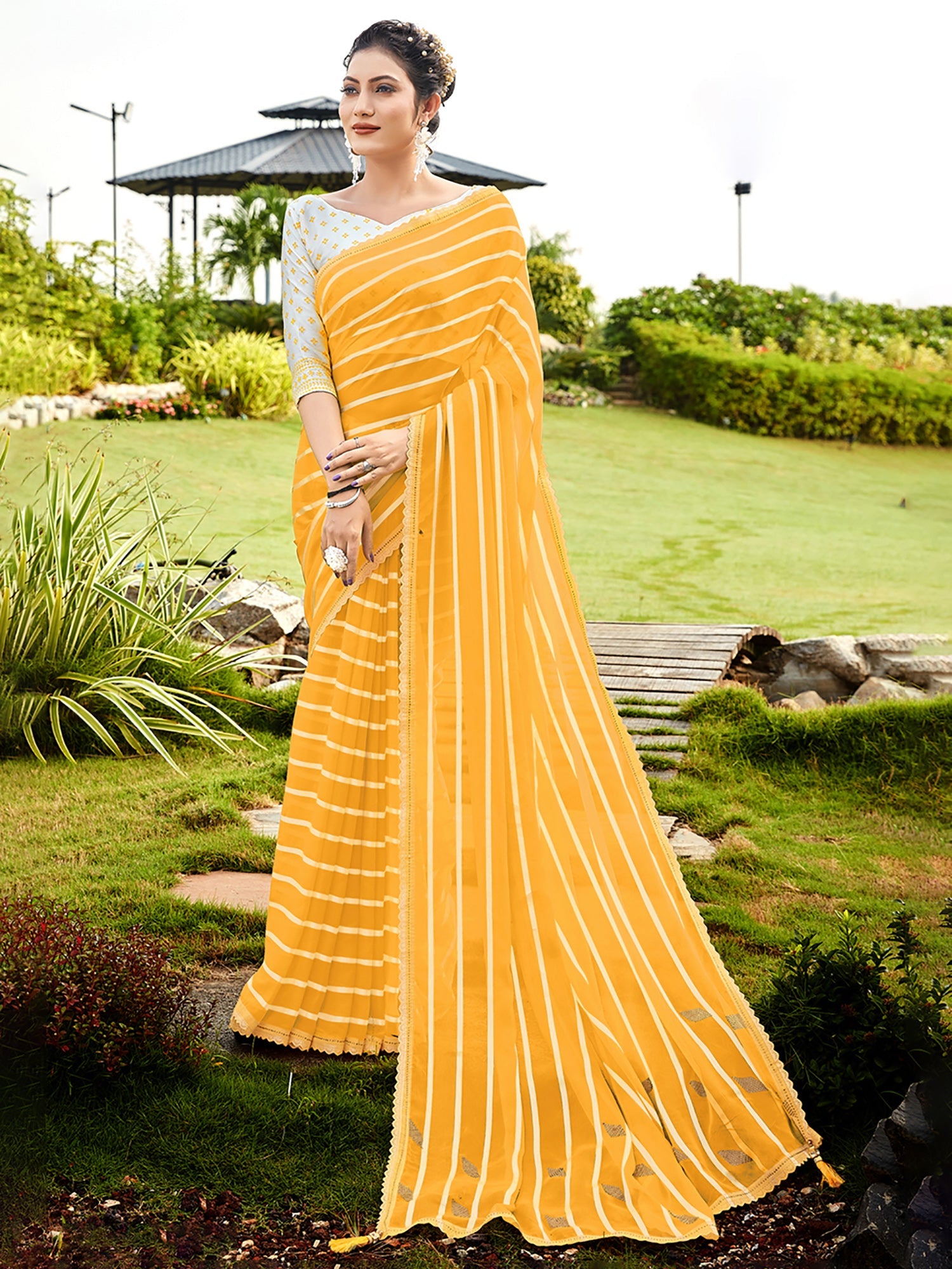 Women's Georgette Yellow Embellished Designer Saree With Blouse Piece