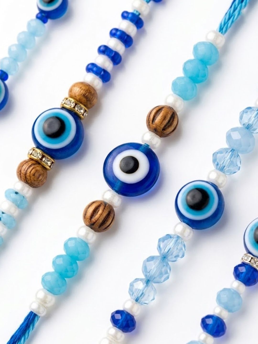 Dhiyona Set Of 5 Blue Evil Eye Thread Rakhi With Roli Chawal Chandan Mishri