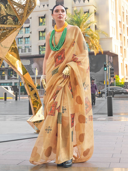 Women's Tissue Beige Woven Design Designer Saree With Blouse Piece