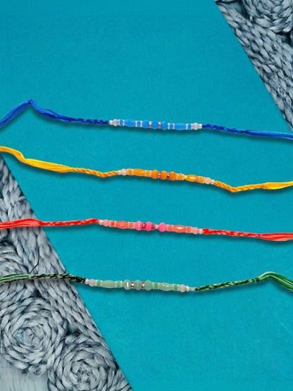 Dhiyona Set Of 4 Multicolor Artificial Beads Thread Rakhi With Roli Chawal Chandan Mishri