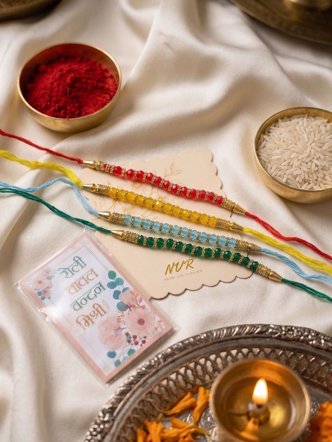 Dhiyona Set Of 4 Multicolor Artificial Beads Thread Rakhi With Roli Chawal Chandan Mishri