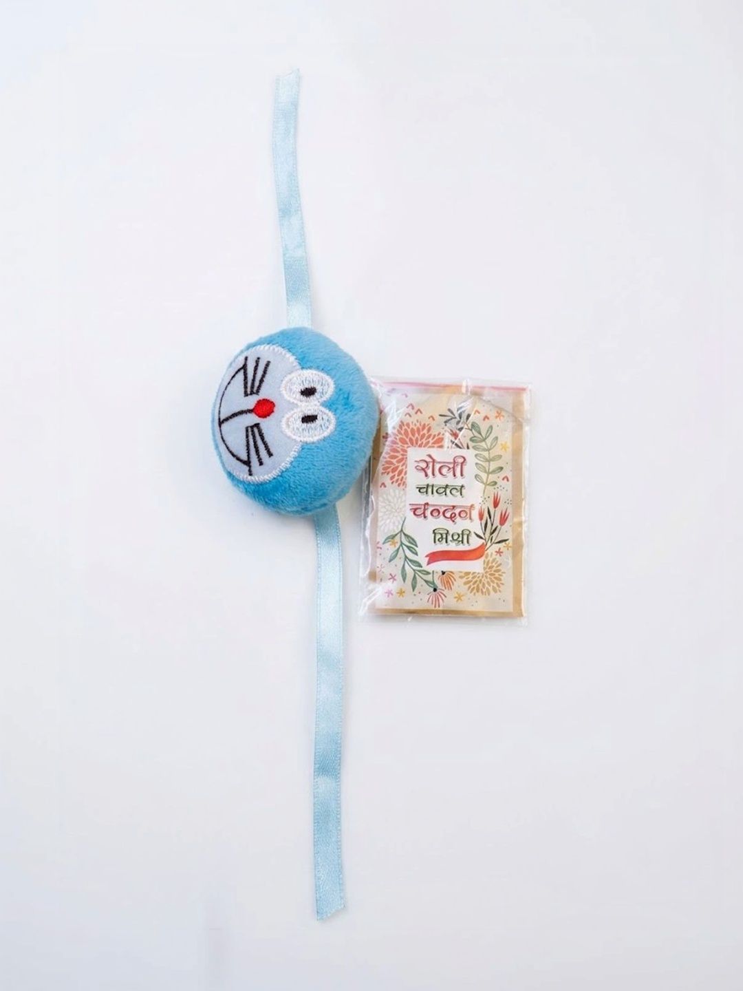 Dhiyona Kids Doremon Design Thread Rakhi With Roli Chawal Chandan Mishri
