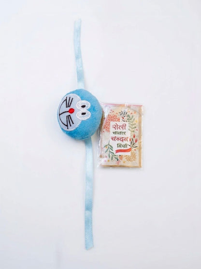 Dhiyona Kids Doremon Design Thread Rakhi With Roli Chawal Chandan Mishri