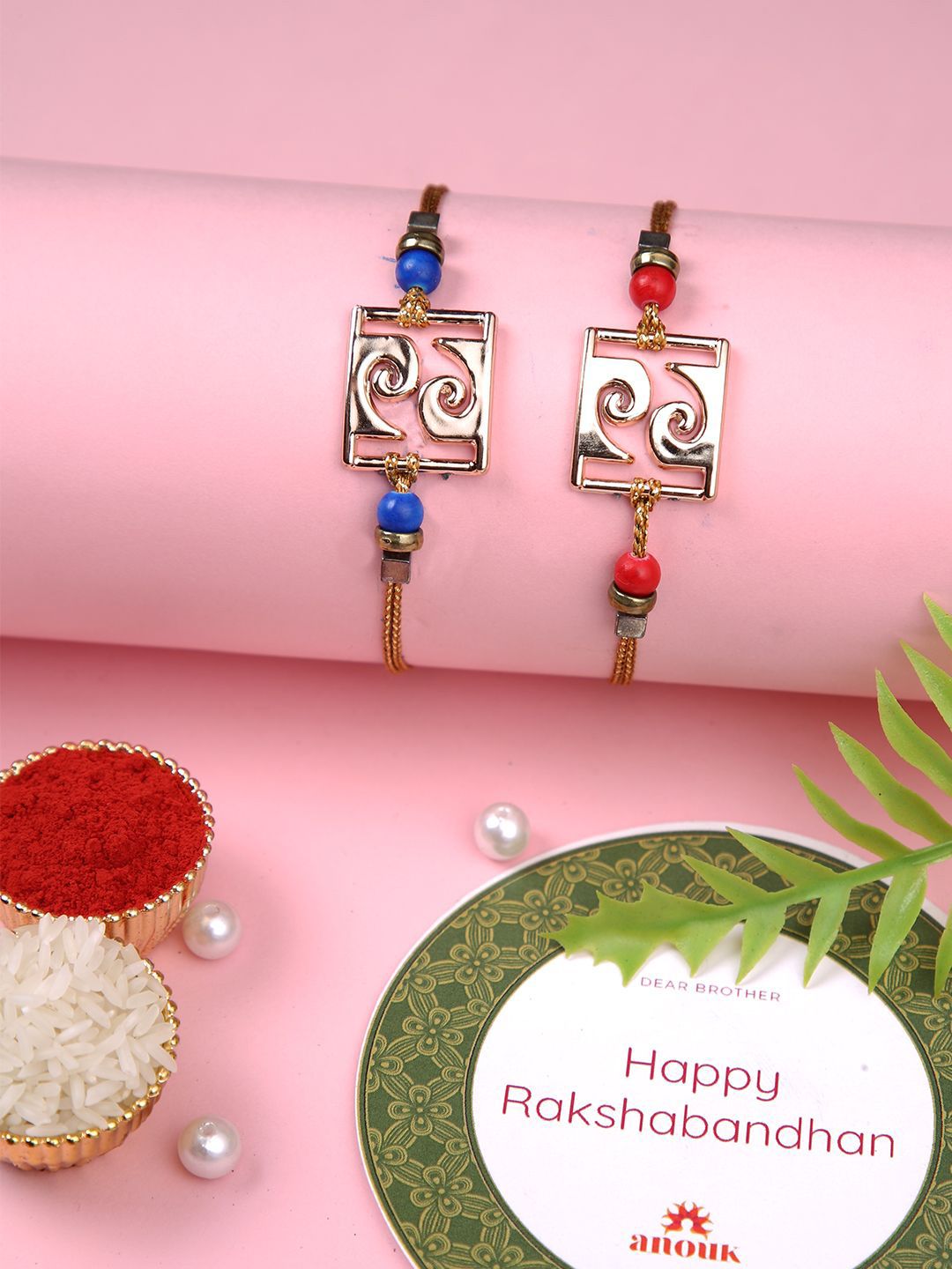 Dhiyona Red Set Of 2 Beaded Square Charm Thread Rakhis With Roli Chawal & Greeting Card