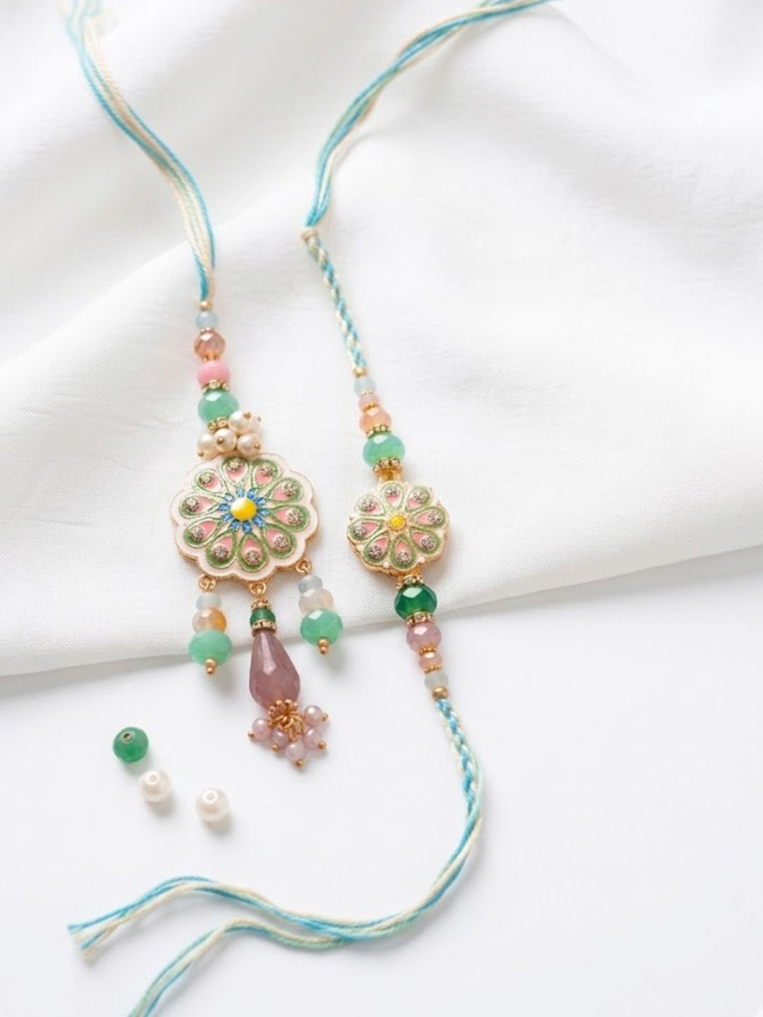 Dhiyona Set Of 2 Round Artificial Beads Traditional Bhaiya Bhabhi Rakhi With Roli Chawal