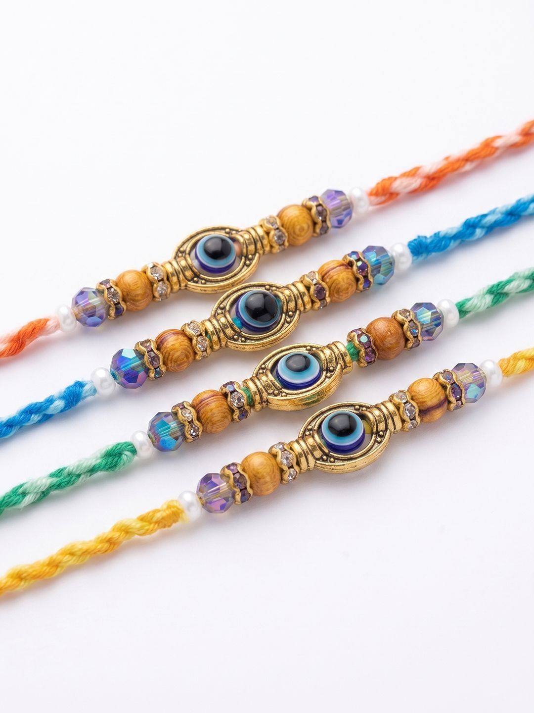 Dhiyona Set Of 4 Multicolor Evil Eye Thread Rakhi With Roli Chawal Chandan Mishri
