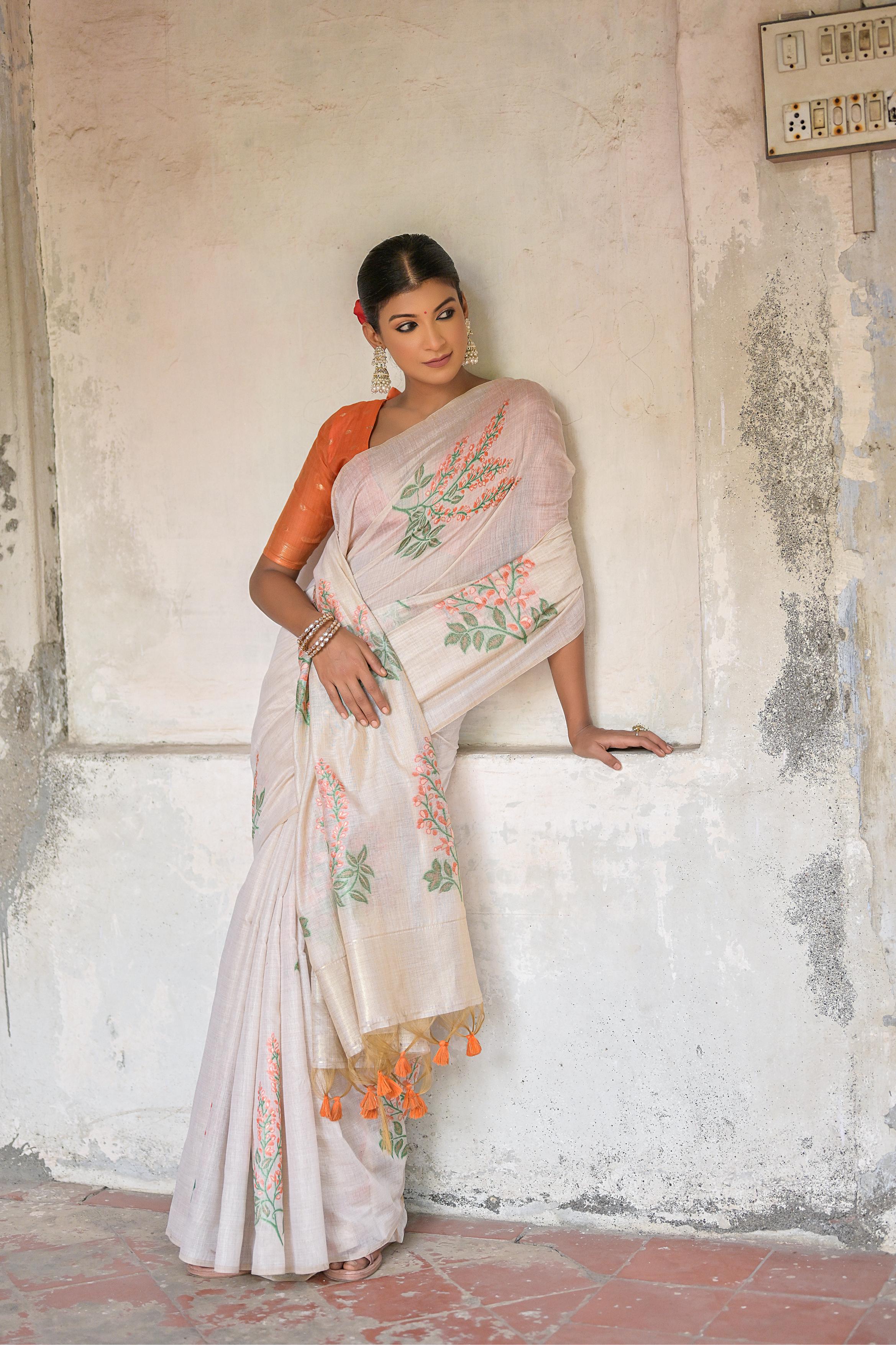 Dhiyona GR Women's Ice White & Orange Muga Cotton Woven Saree