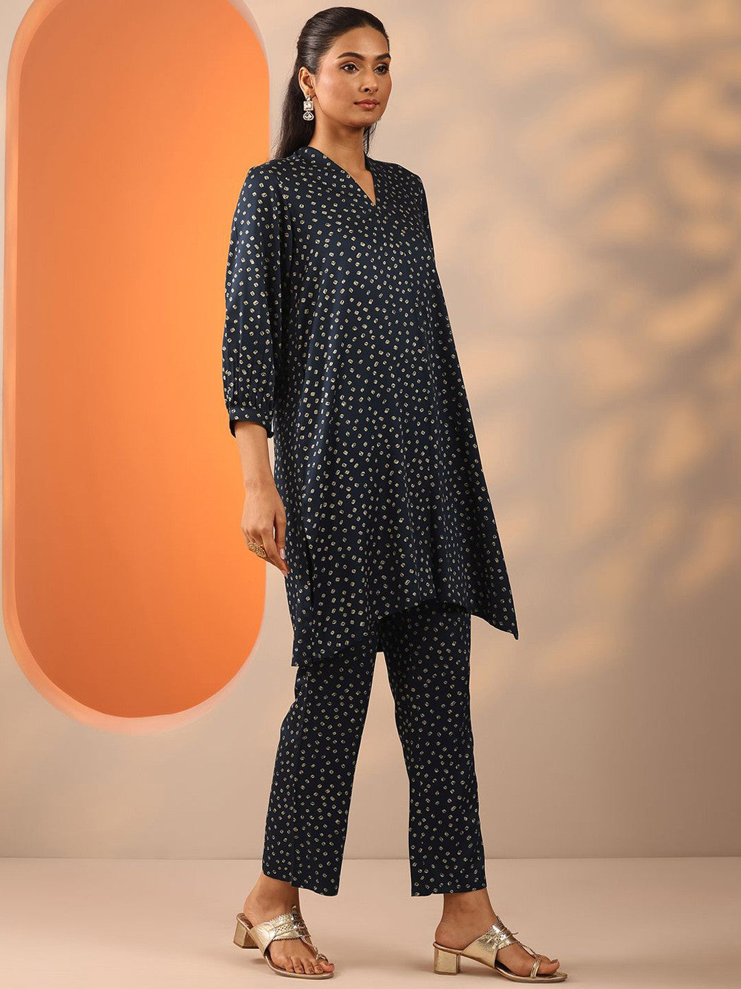 Bandhani Printed Pleated V-Neck A-Line Kurta With Trouser & Potli