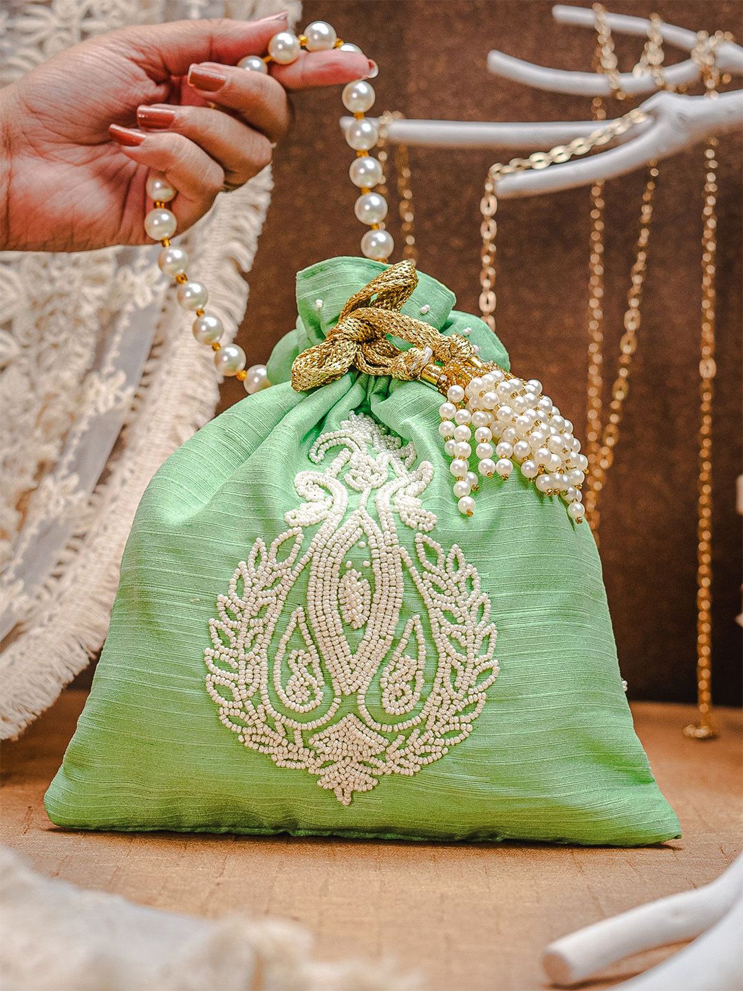 Dhiyona NR Ethnic Motic Embroidered Potli Clutch