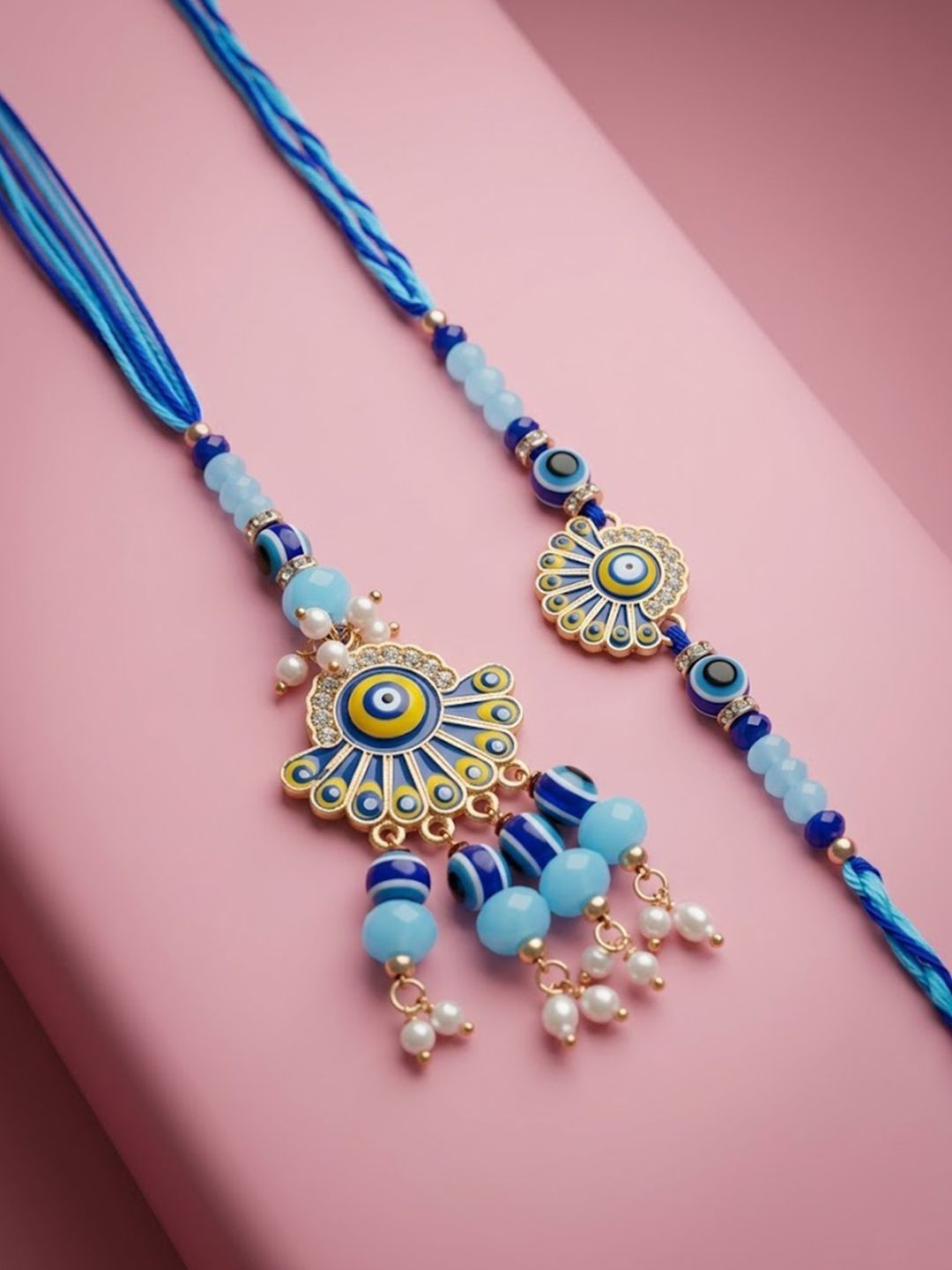Dhiyona Set Of 2 Blue Evil Eye Artificial Beads Bhaiya Bhabhi Rakhi With Roli Chawal