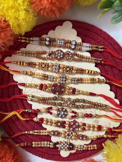 Dhiyona Set Of 10 Artificial Stones & Beads Thread Rakhi With Roli Chawal Chandan Mishri