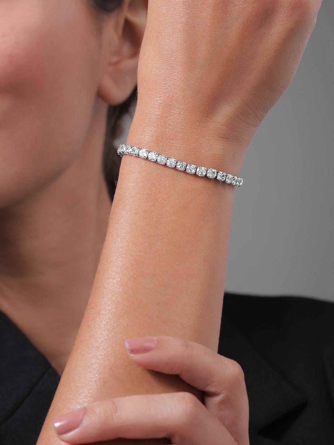 Dhiyona RJ Women's Rhodium Plated Sparkling AD & Cubic Zirconia Studded Tennis Bracelet