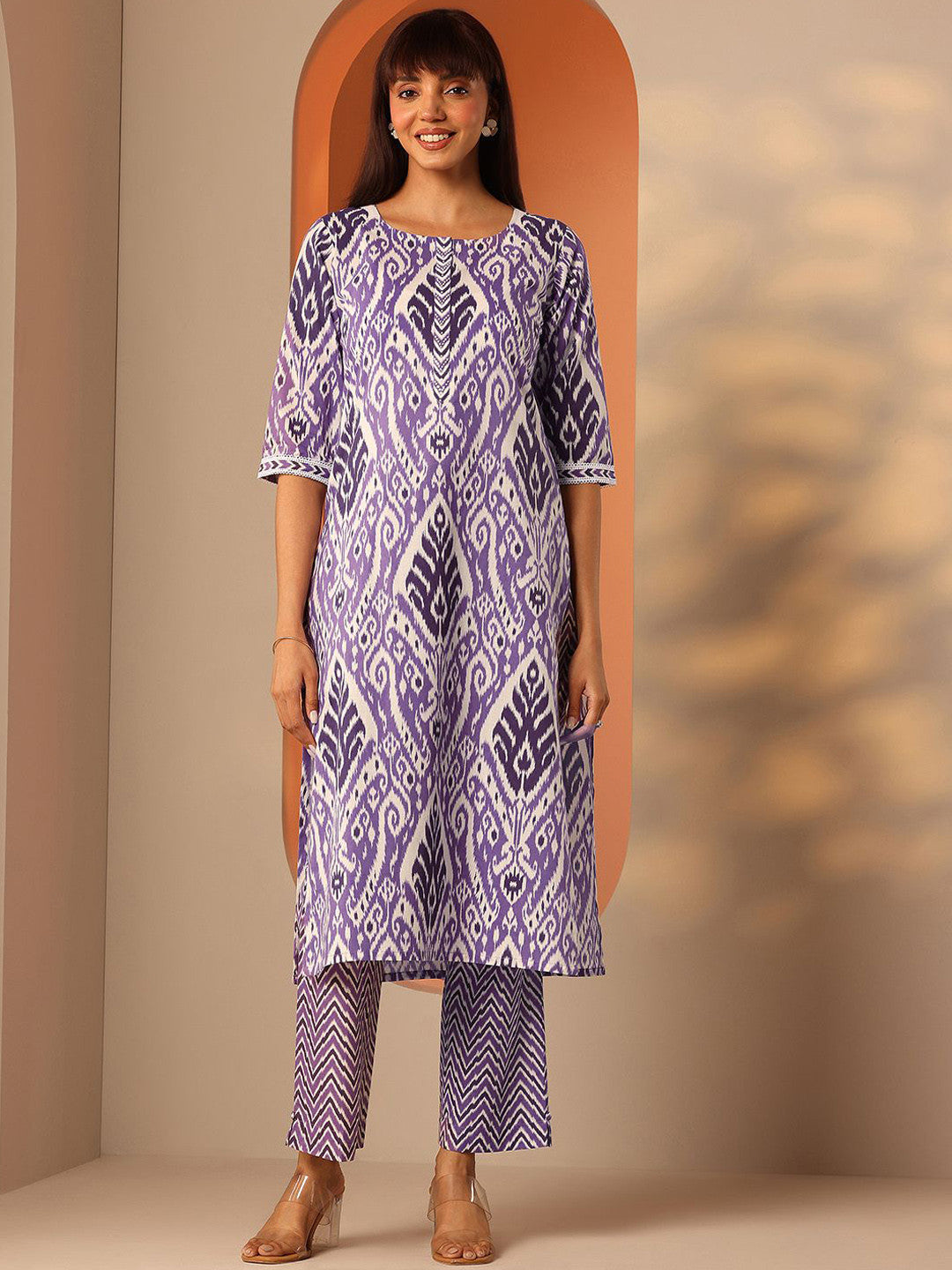 Women Abstract Printed Kurta with Trousers
