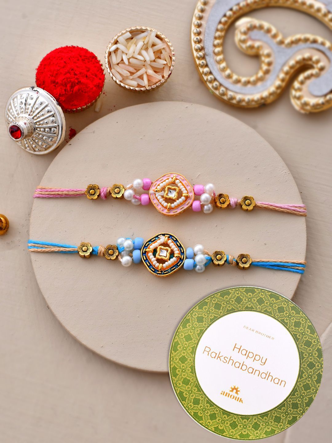 Dhiyona Set Of 2 Kundan Studded Thread Rakhi With Roli Chawal & Greetings Card