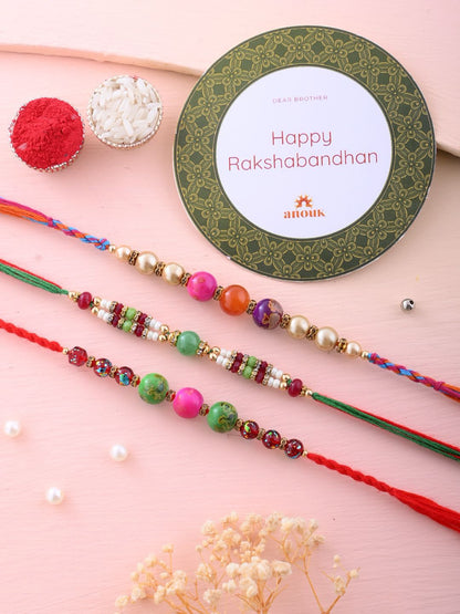 Dhiyona Red Set Of 3 Stone Studded & Beaded Thread Rakhi With Roli Chawal & Greeting Card