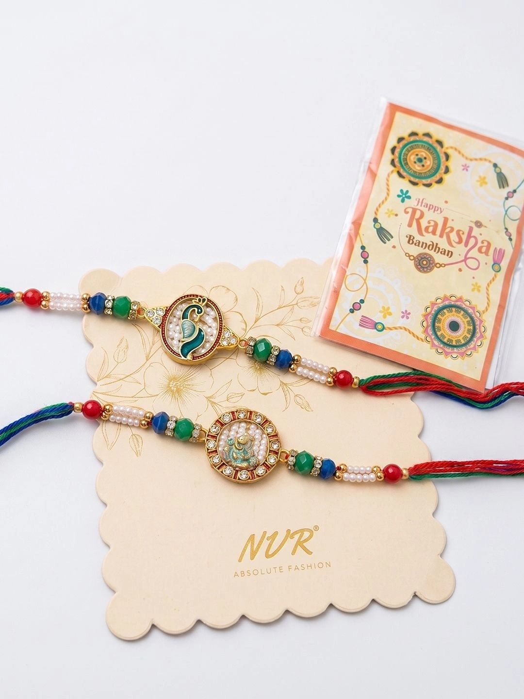 Dhiyona Set Of 2 Multicolor Peacock Design Rakhi With Roli Chawal Chandan Mishri