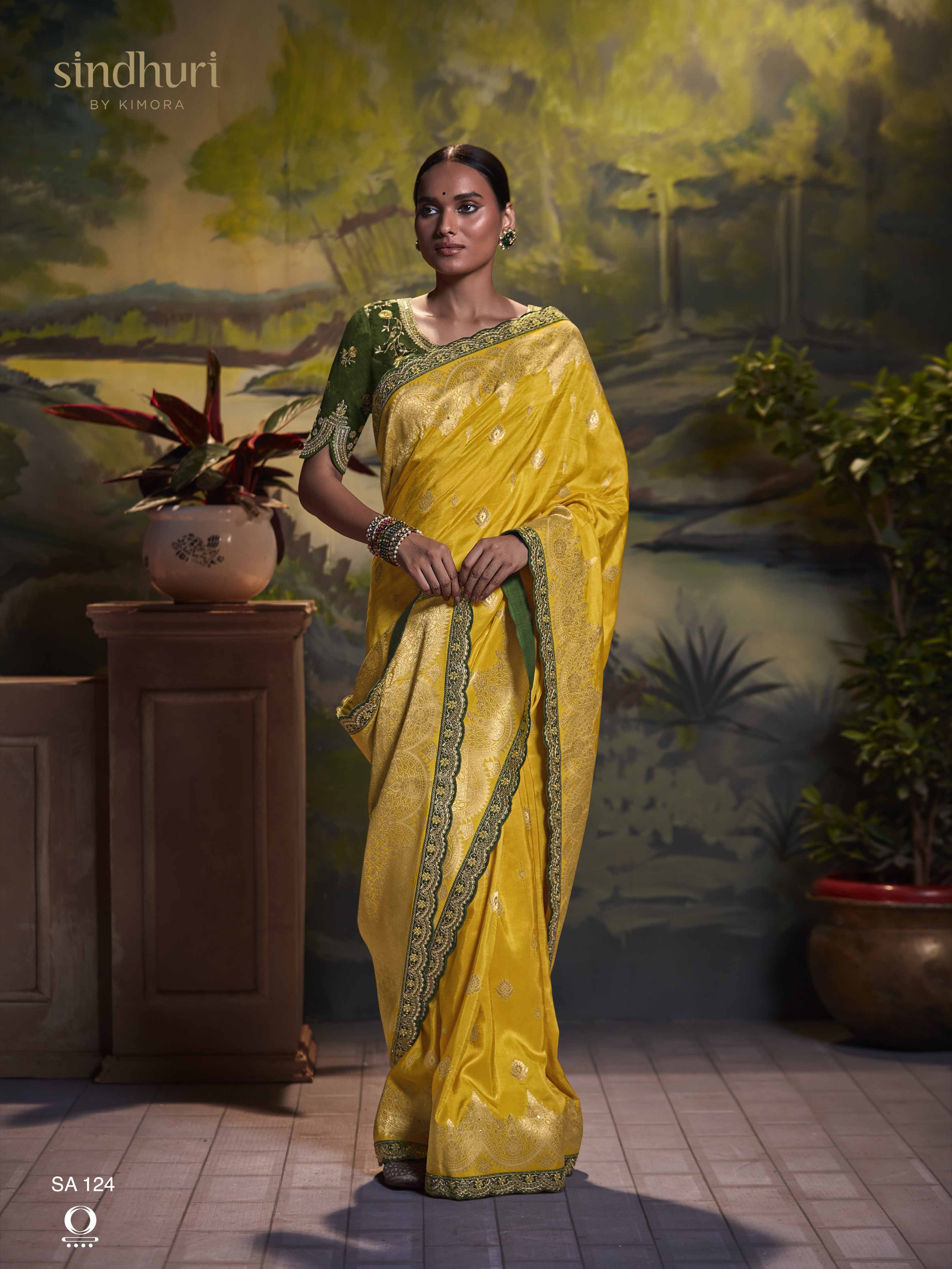 Dhiyona KM Women Yellow Pure Dola Silk Saree With Contrasting Green Embroidered Blousee