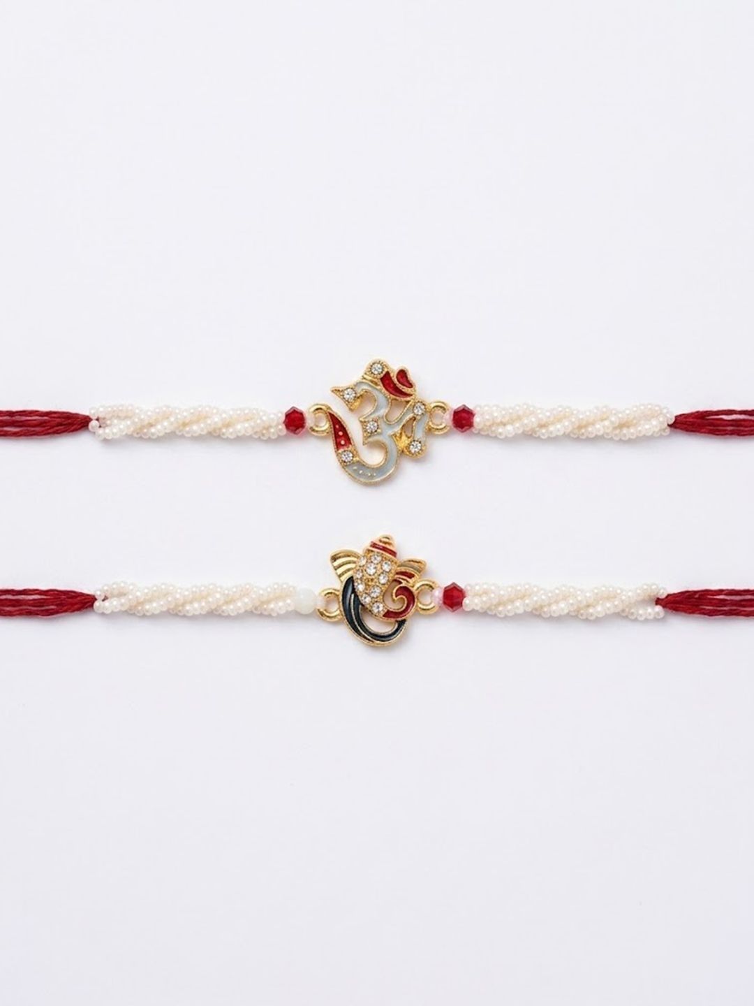 Dhiyona Set Of 2 White Pearls Om & Ganesh Ji Thread Rakhi With Roli Chawal Chandan Mishri
