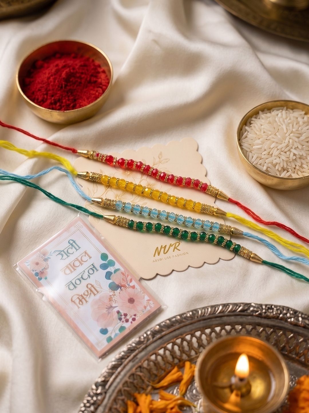 Dhiyona Set Of 4 Multicolor Artificial Beads Thread Rakhi With Roli Chawal Chandan Mishri