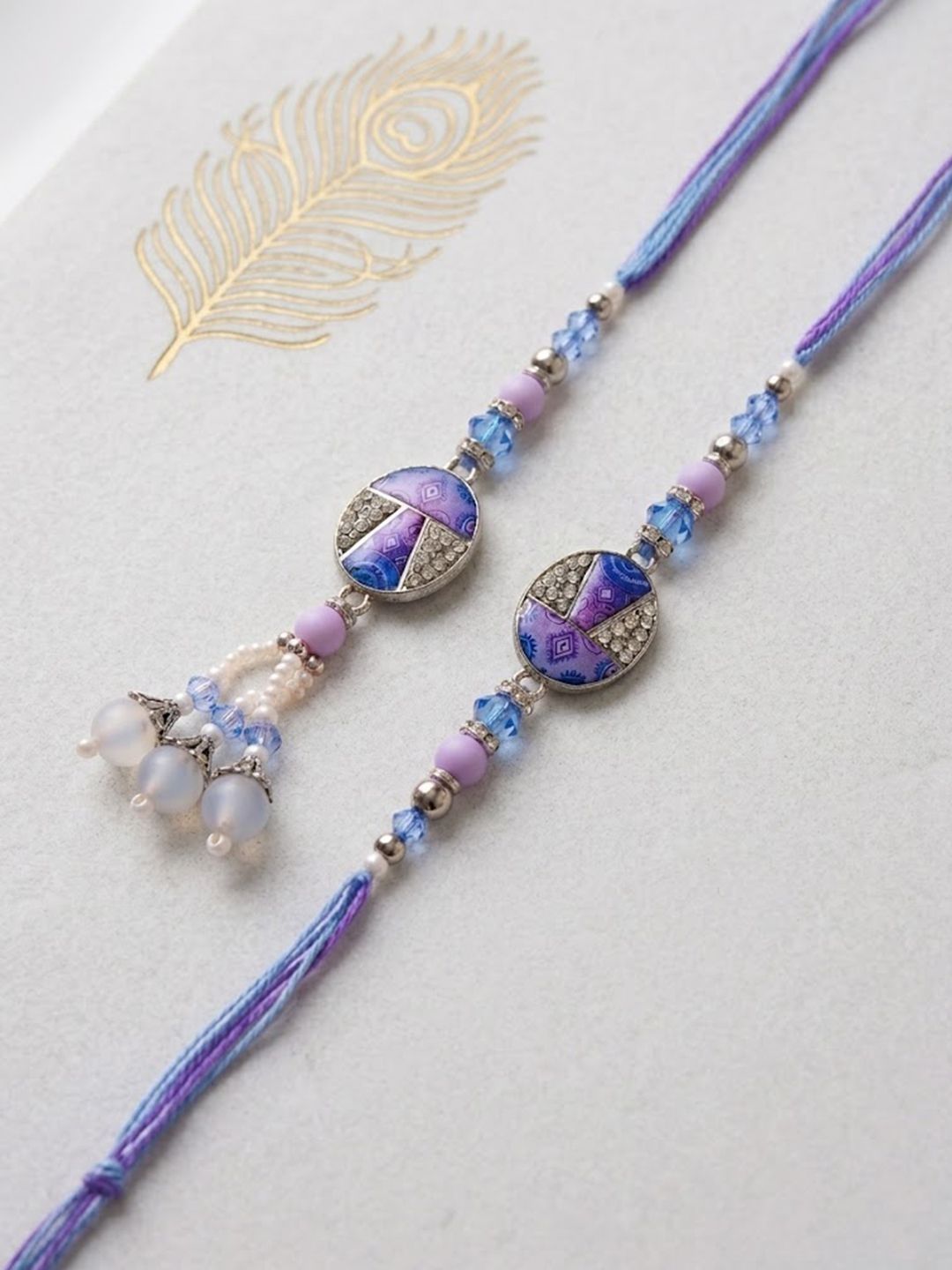 Dhiyona Set Of 2 Purple Artificial Beads Traditional Bhaiya Bhabhi Rakhi With Roli Chawal