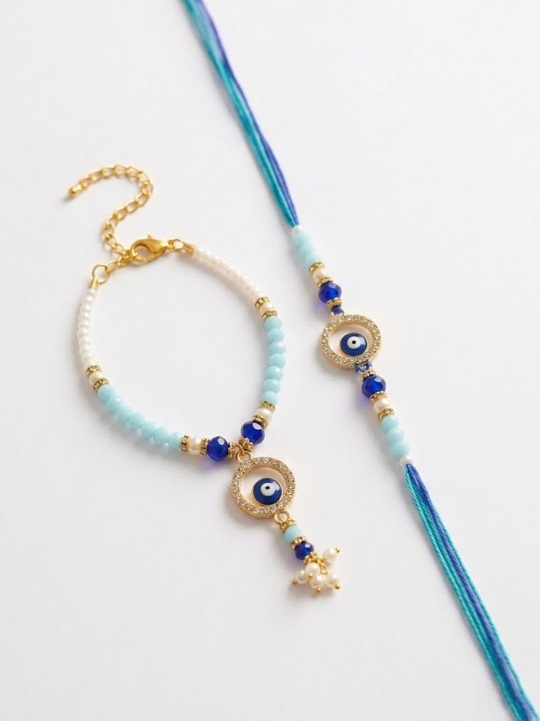 Dhiyona Set Of 2 Blue Evil Eye Gold Toned Beaded Bhaiya Bhabhi Rakhi