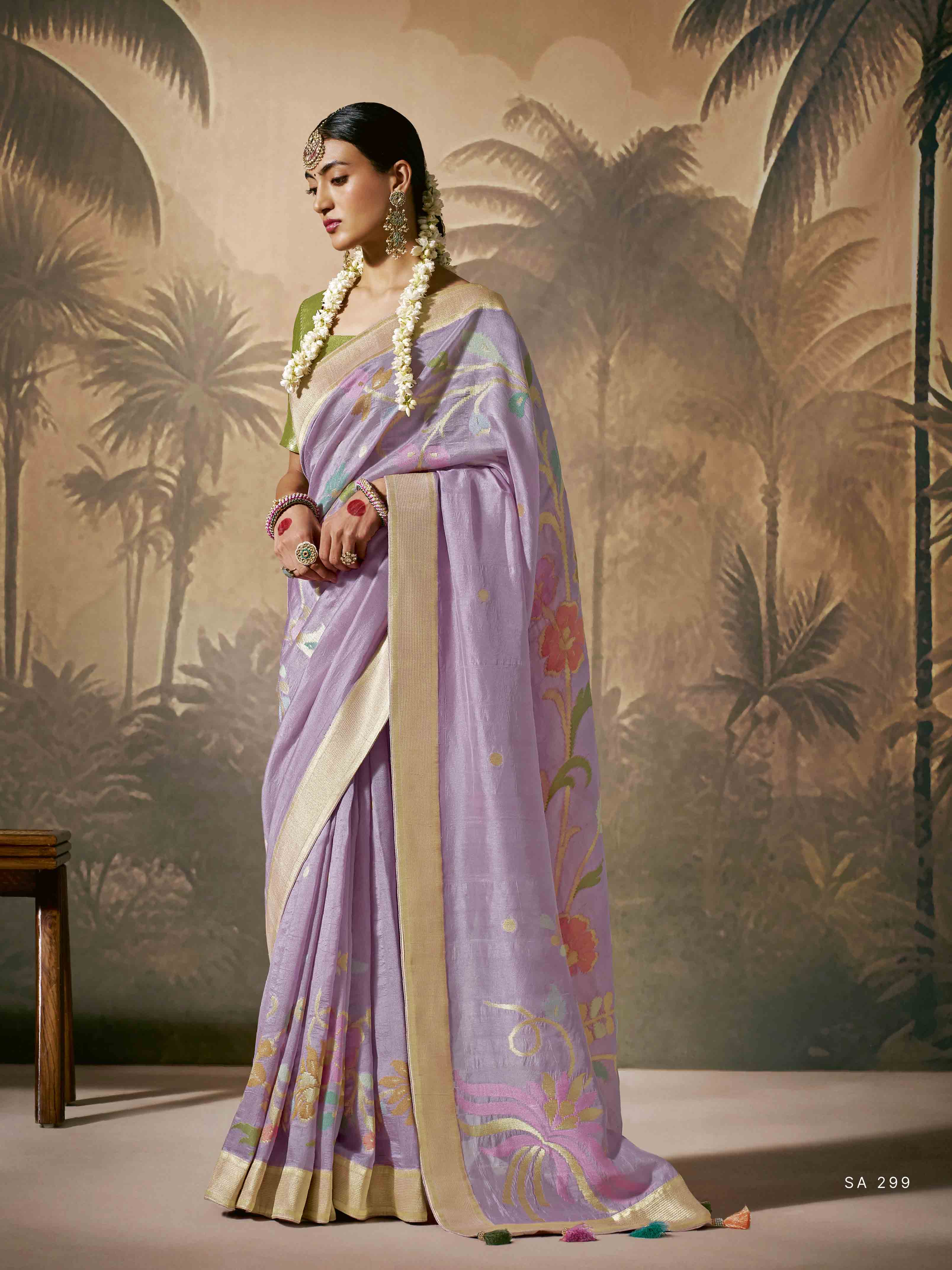 Dhiyona KM Women Royal Purple Silk Saree With Stunning Contrast Green Blouse