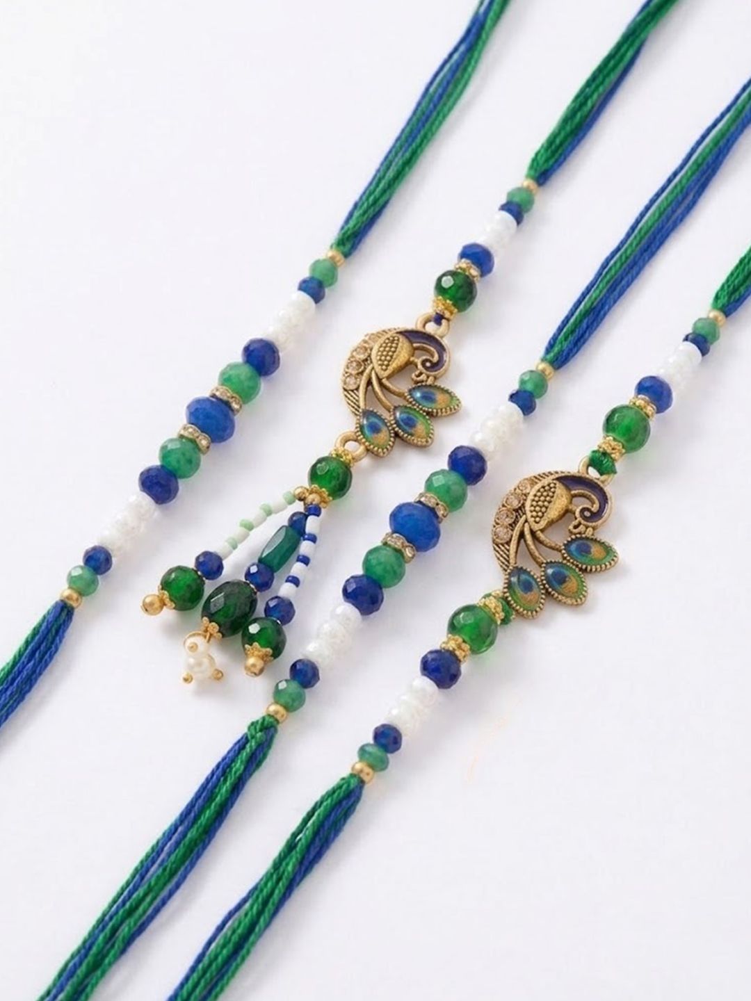 Dhiyona Set Of 4 Green Peacock Design Artificial Beads Thread Rakhi With Roli Chawal