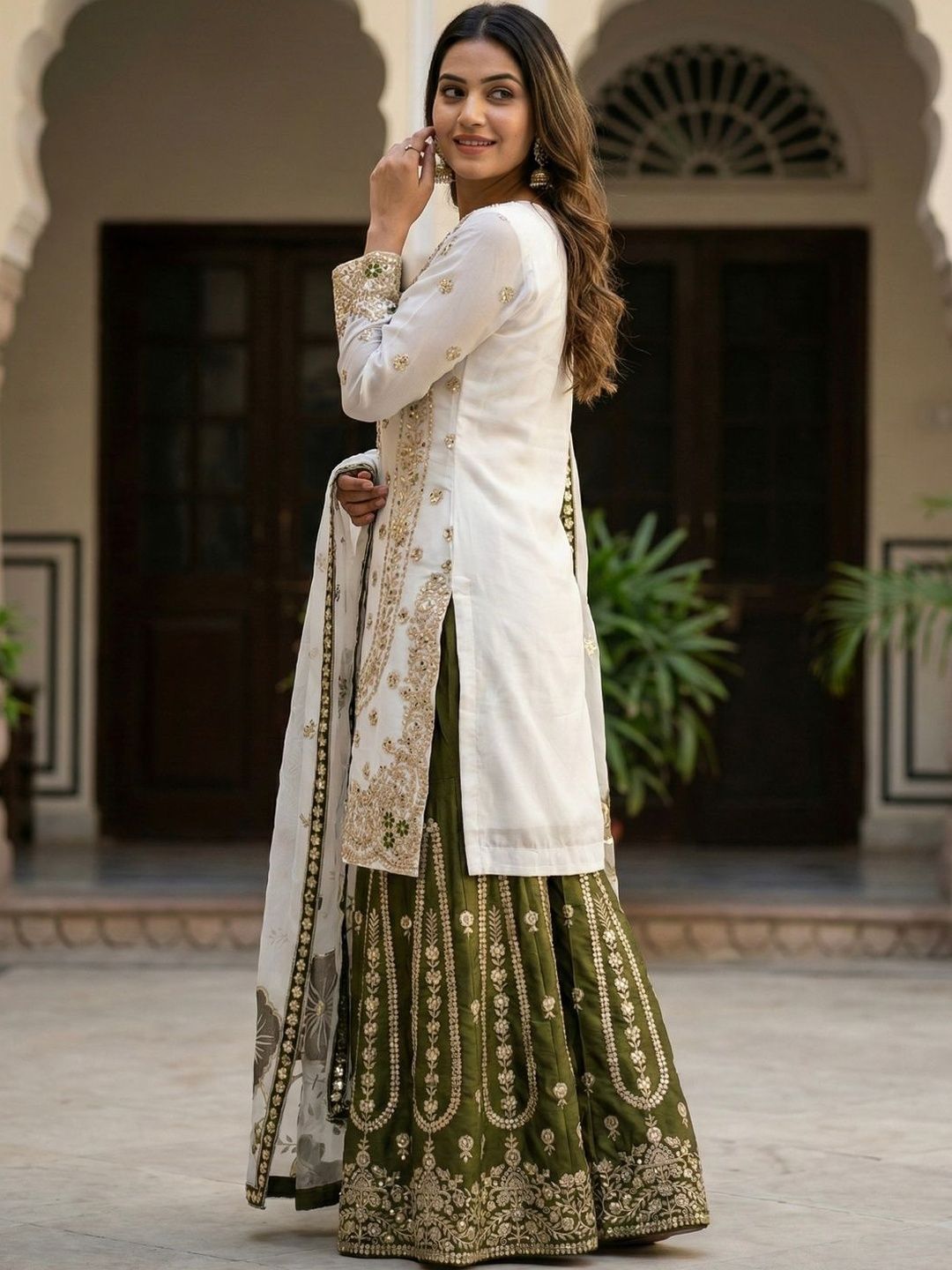 Dhiyona KL Women Ethnic Motifs Embroidered Regular Sequinned Kurta with Sharara & With Dupatta
