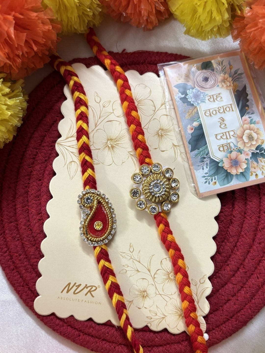 Dhiyona Set Of 2 Gold & Red Thread & Kundan Rakhi With Roli Chawal Chandan Mishri