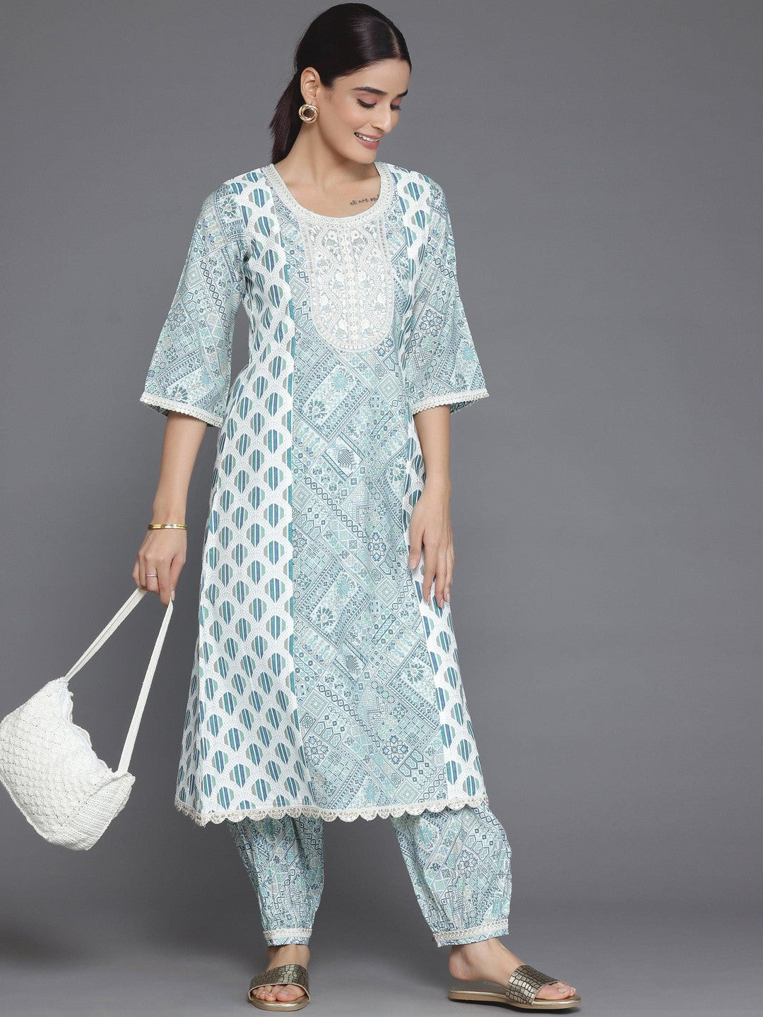 Women Ethnic Motifs Printed Regular Thread Work Kurta with Trousers