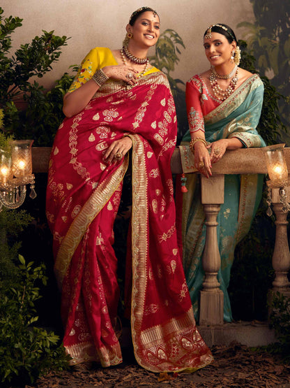 Dhiyona KM Women Light Blue Silk Zari Weaved Saree With Broad Border & Red Embroidered Blouse