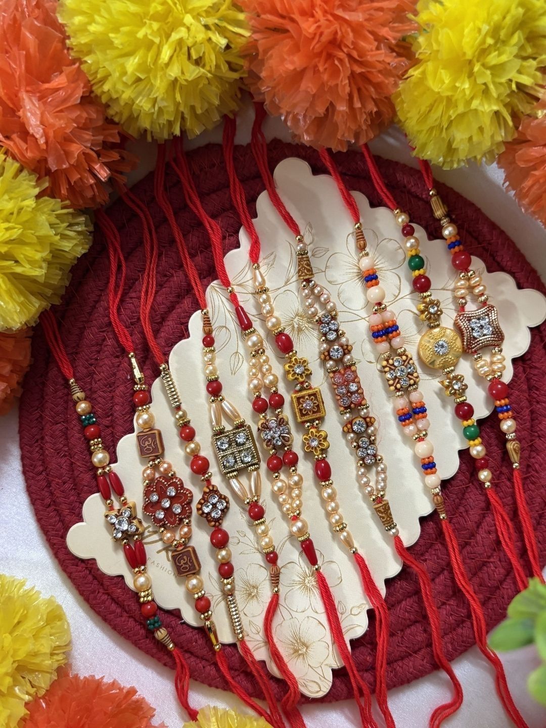 Dhiyona Set Of 10 Artificial Stones & Beads Thread Rakhi With Roli Chawal Chandan Mishri