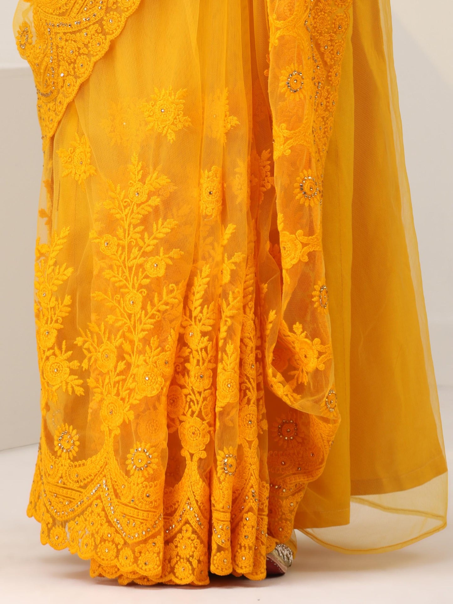 Dhiyona ST Yellow Net Saree with All over Thick Scallop Embroidery and Shiny Dots with Blouse Fabric