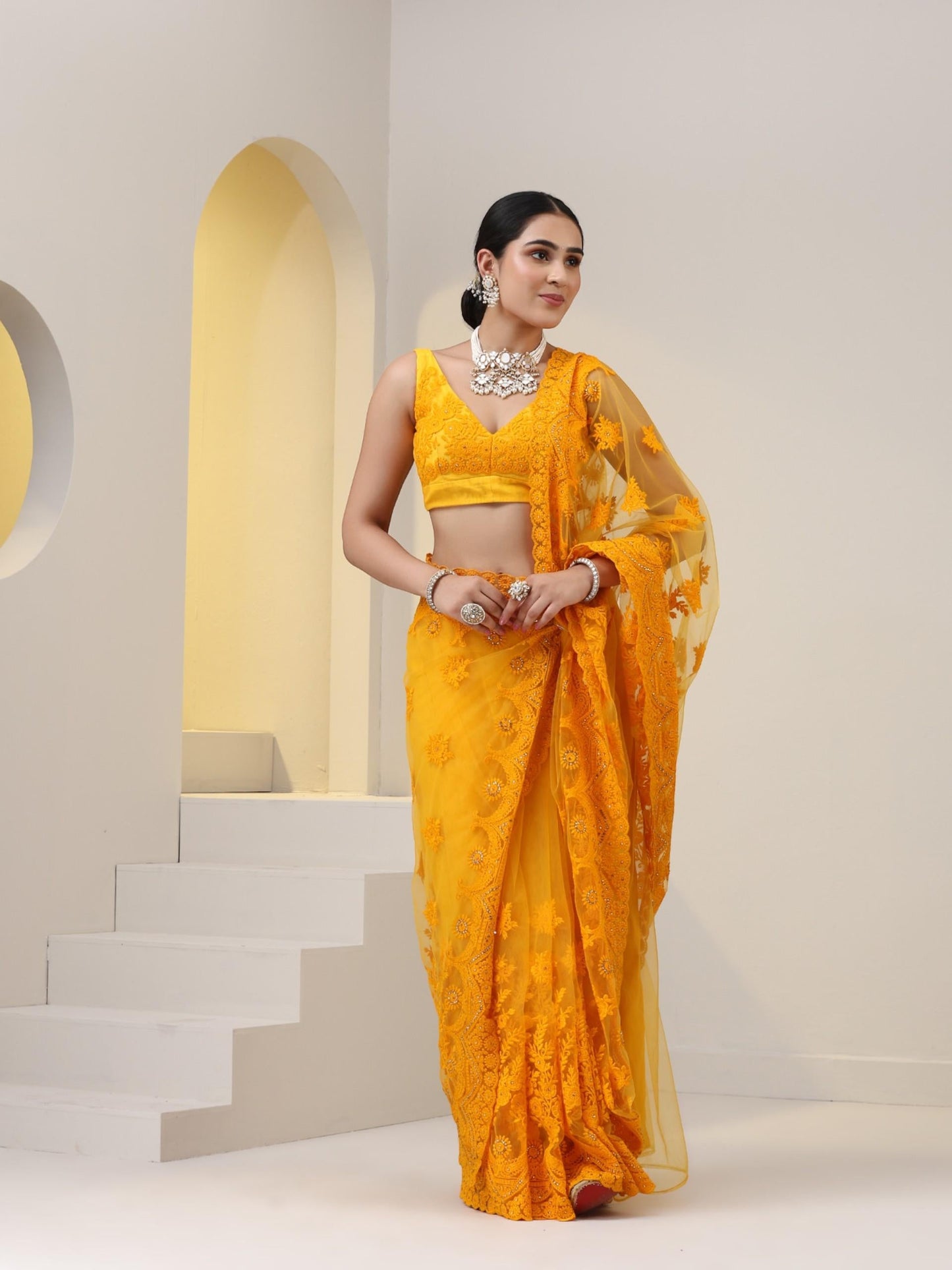 Dhiyona ST Yellow Net Saree with All over Thick Scallop Embroidery and Shiny Dots with Blouse Fabric