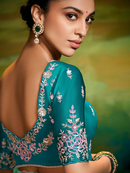 Dhiyona KM Women Elegant Sea Green Pure Tissue Silk Saree With Floral Embroidery