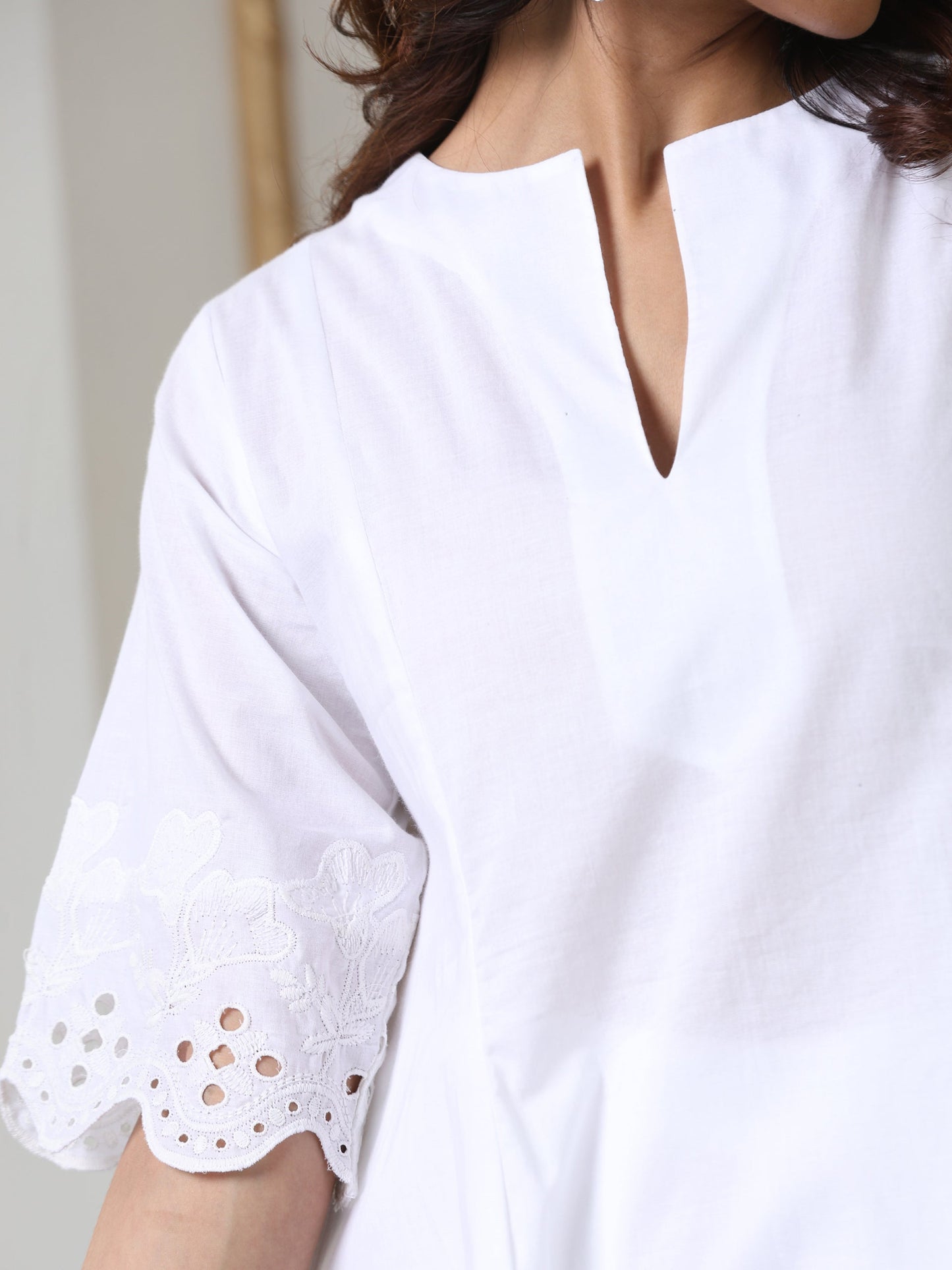 Dhiyona ST Women’s White Hi-Low Suit Set with Palazzo | 2 Pc Set, Cotton Cambric Fabric, Schiffli Embroidery on Hem & Sleeve, Half Sleeves, Casual , Festive Party Wear